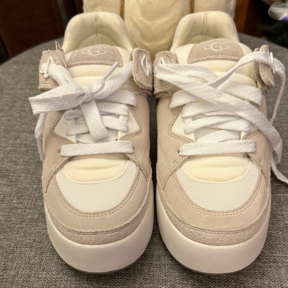 UGG Woman’s ' Cream and White Sneakers NWOB- RUN 1/2 SIZE SMALL